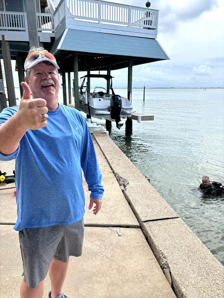 Owner reunited with recovered Texas A&M Aggie ring after underwater metal detecting search